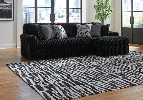 Midnight Madness Black Sectional Sofa with Chaise