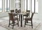 Jeshina Counter Height Table with 4 Chairs