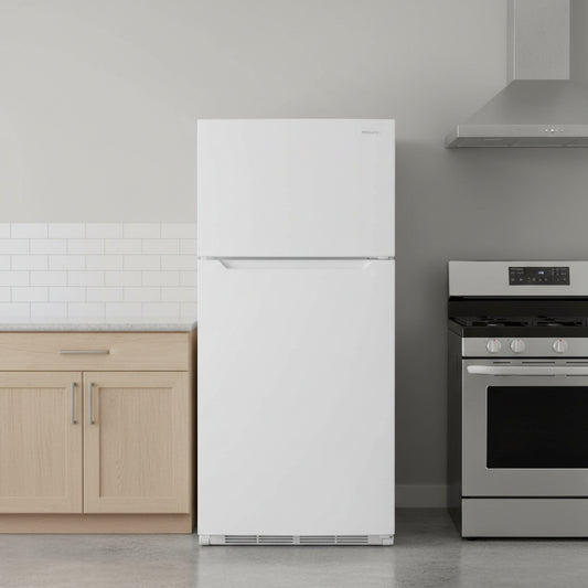 White refrigerator with freezer on a white background